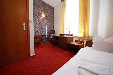Фото номера Одноместный номер Отель Hotel Staromiejski г. Слупск 3