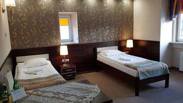 Фото номера Улучшенный двухместный номер с 2 отдельными кроватями Отель Hotel Atena г. Слупск 4